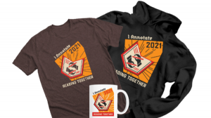 A brown t-shirt, black hoodie, and white mug all with the #ianno21 logo.